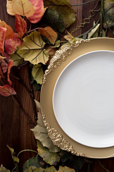 pretty gold charger and white plate for thanksgiving