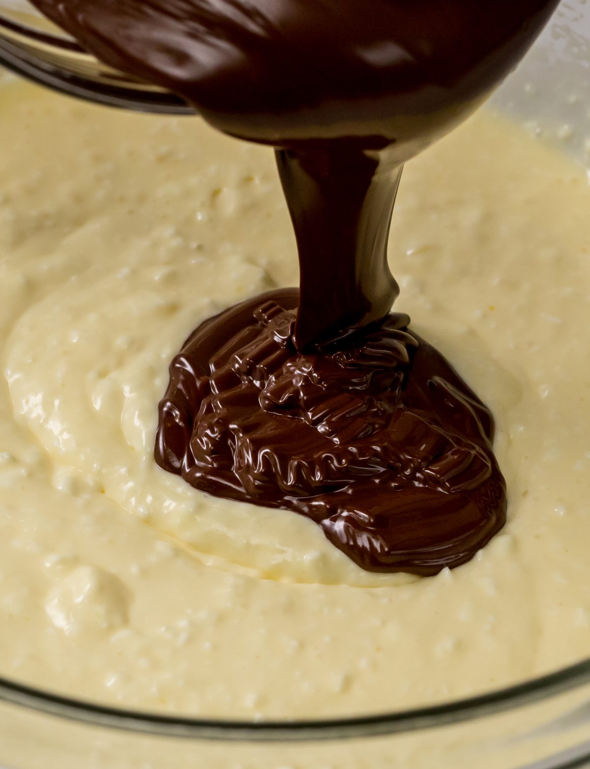 Adding the creamy chocolate to the batter