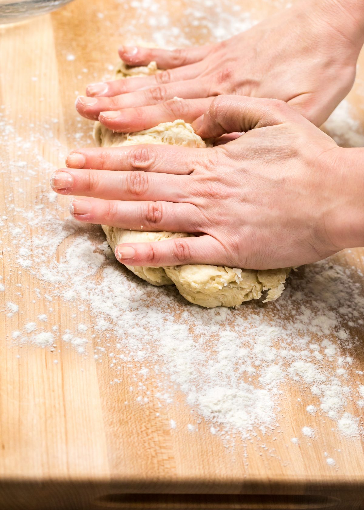 Once dough is a elastic consistency turn out onto a floured surface