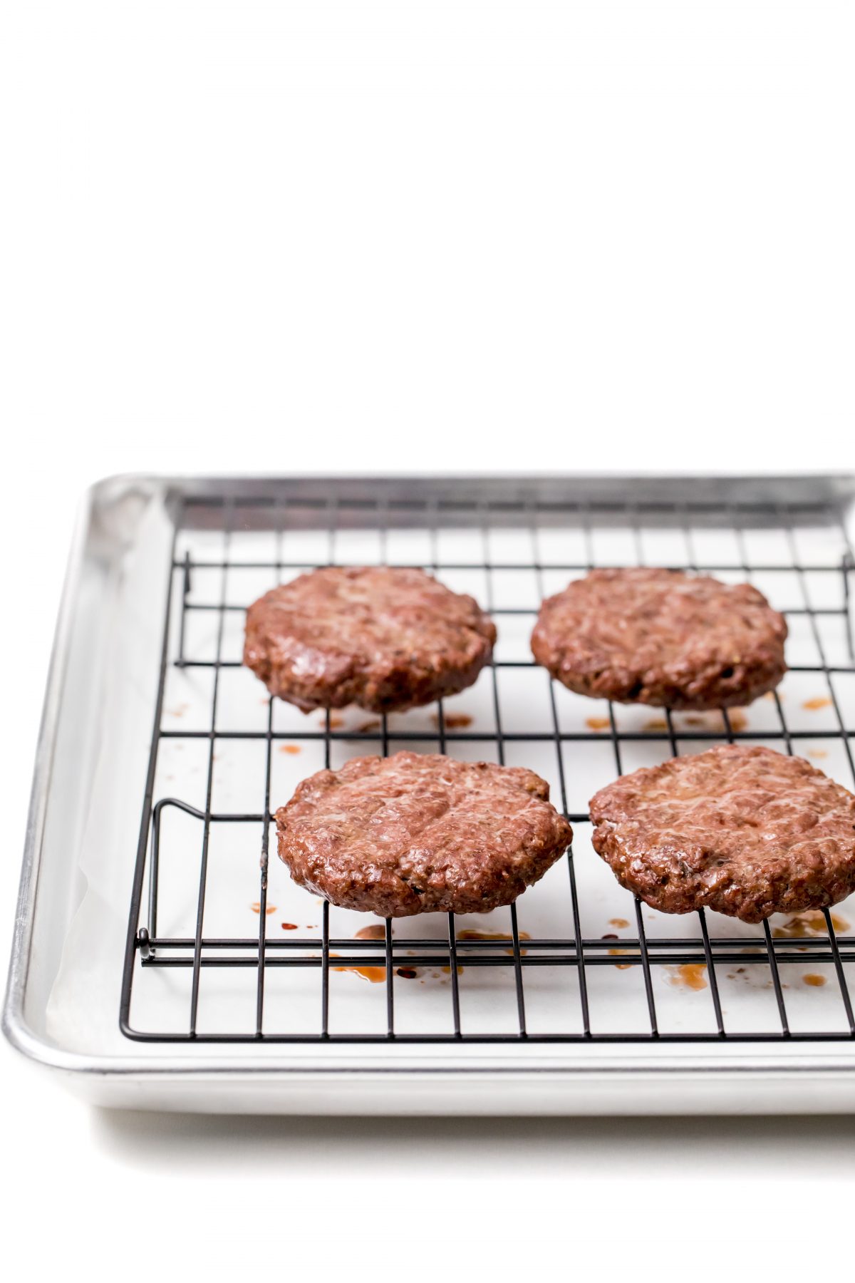 Oven baked burgers cooked burger patties on oven rack