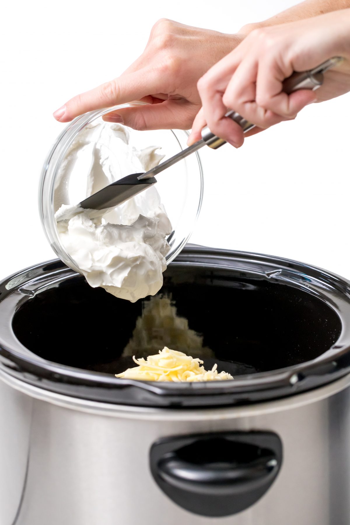 Scoop sour cream into Slow-cooker pale ale corn dip