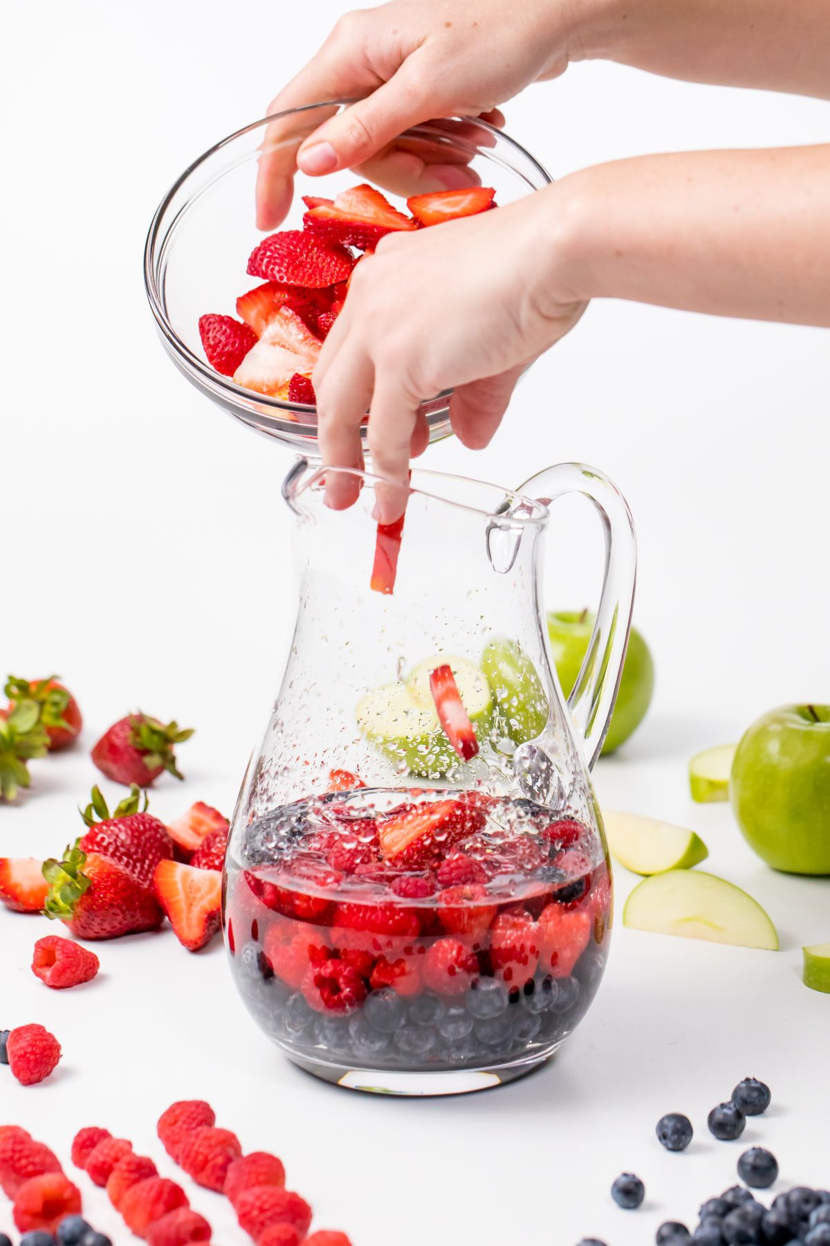 add berry mixture to sangria