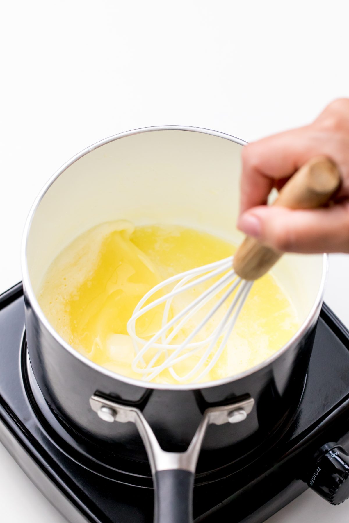 Melt butter in a saucepan.