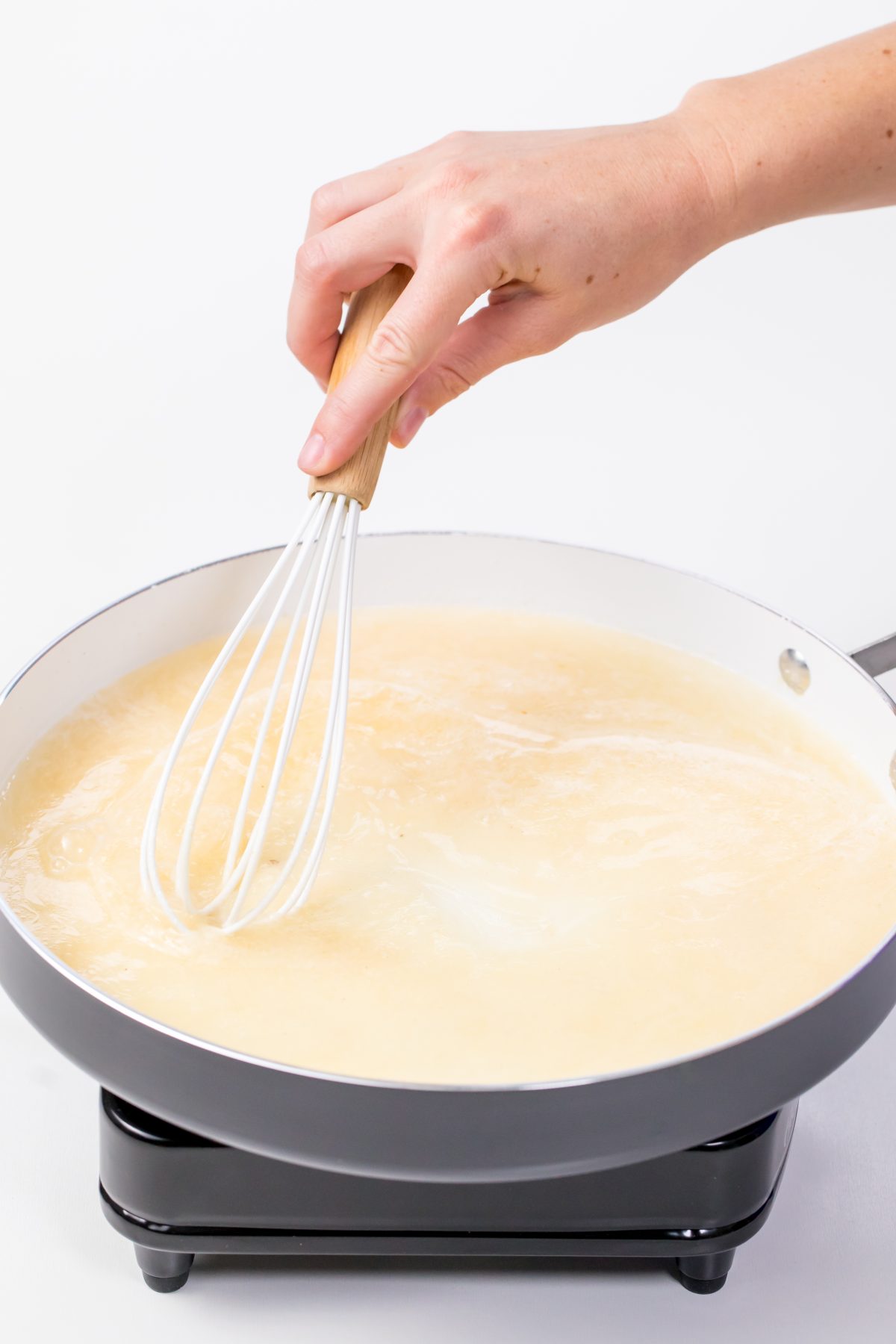 Whisk broth into flour