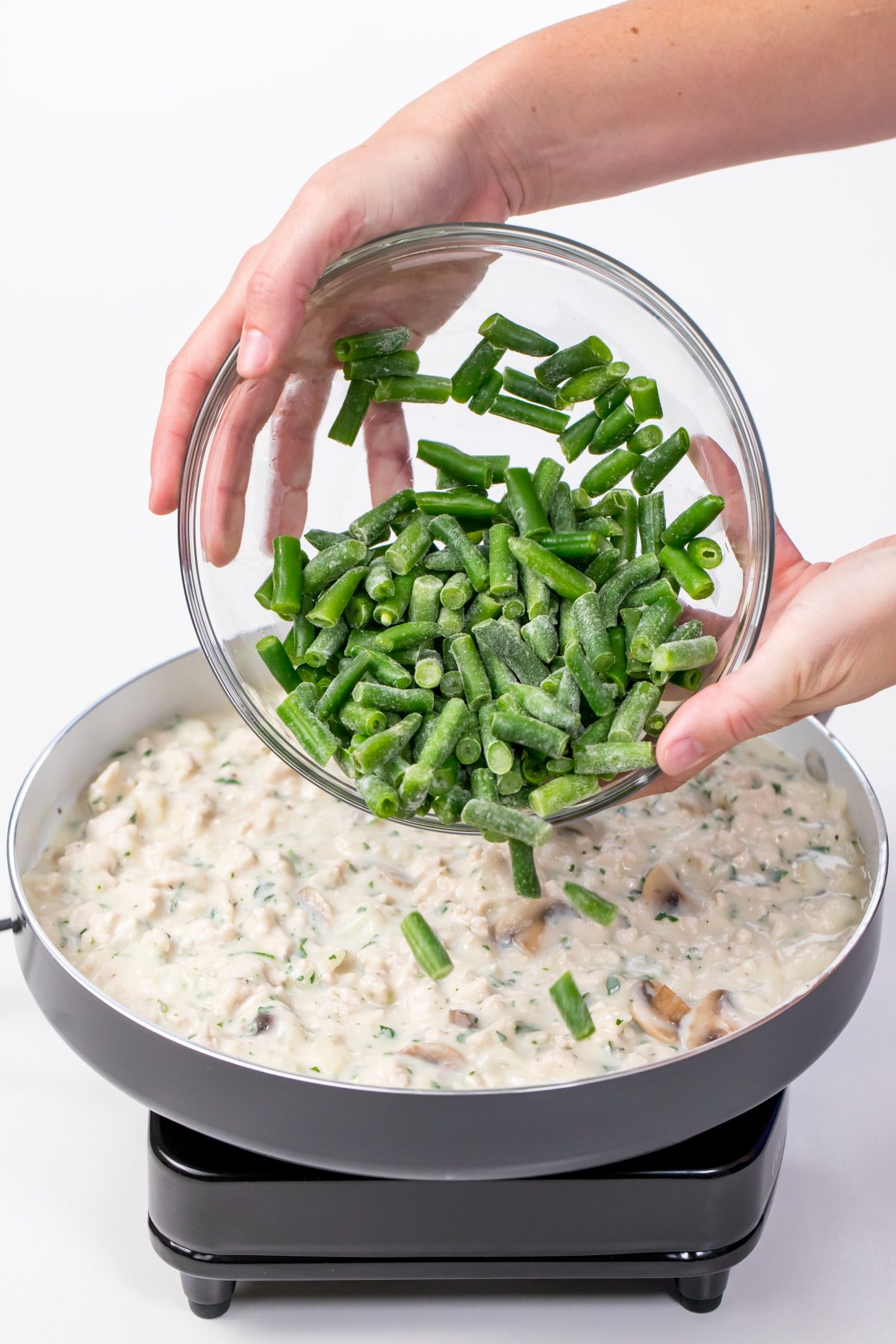 Add frozen green beans to mix