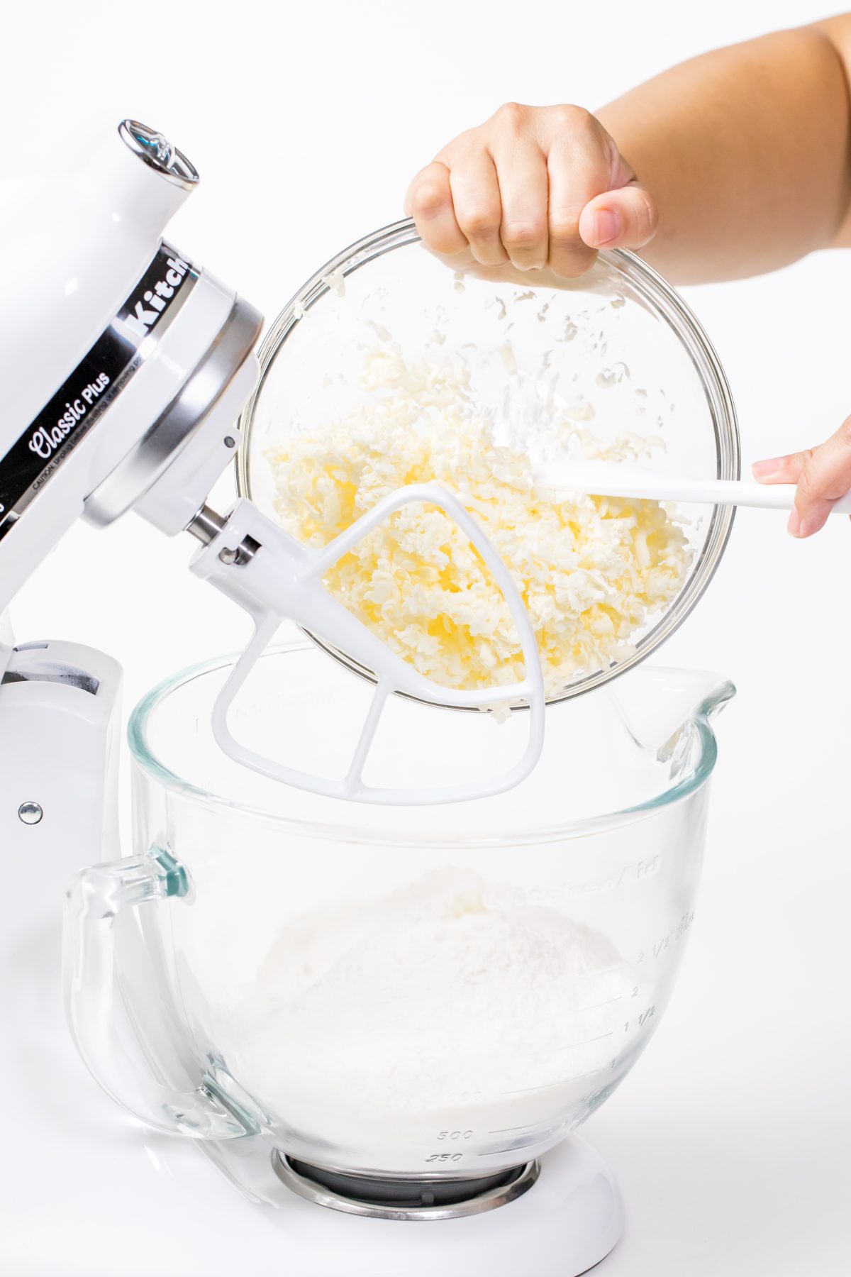 Add shredded butter to flour mixture