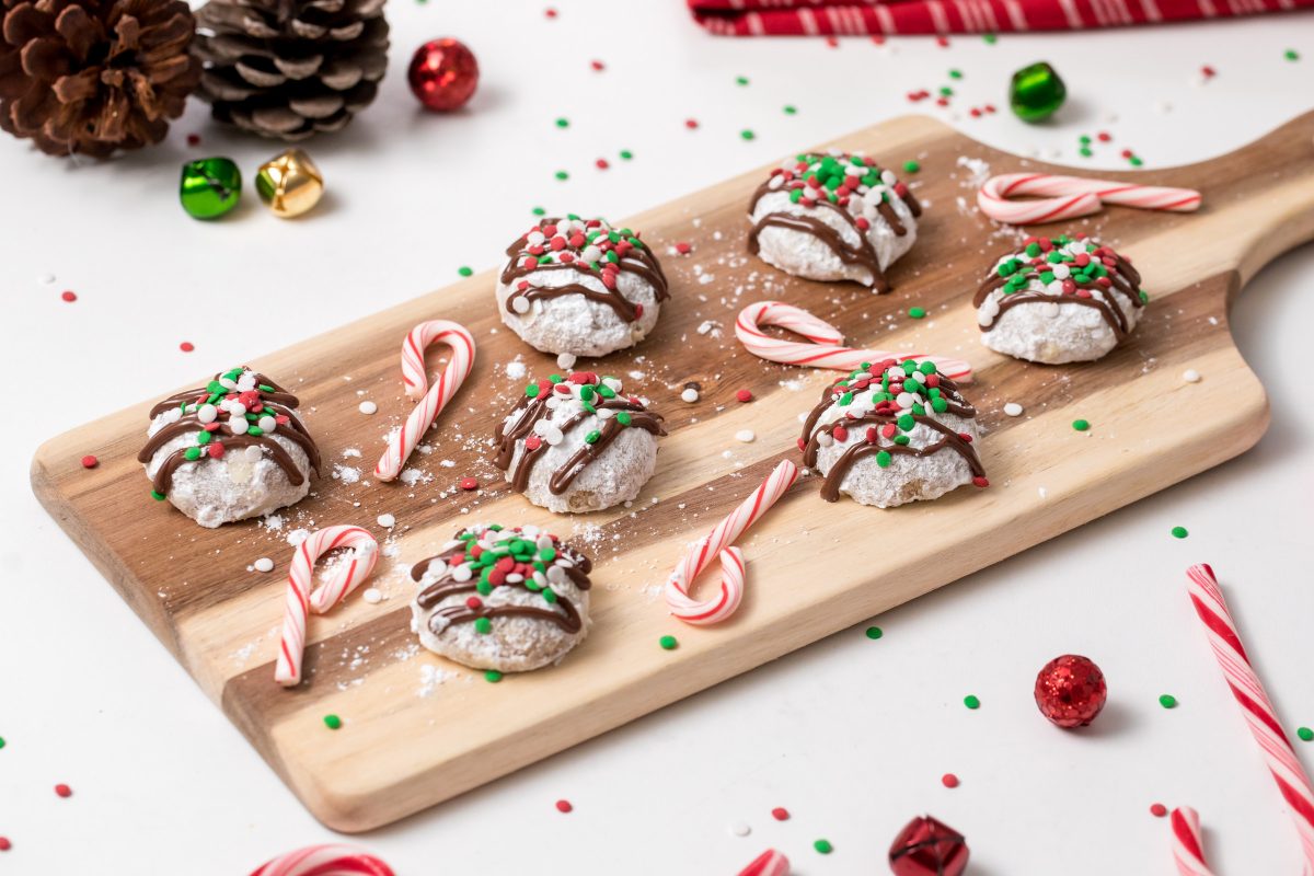 5D4B5502 - Chocolate Covered Snowball Peppermint Cookies - Refrigerate the snowballs to set the chocolate. Serve.